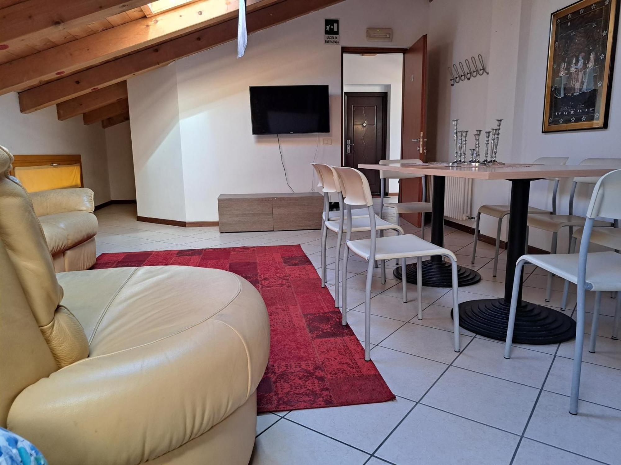 Lunga Via Delle Dolomiti Hotell Calalzo di Cadore Rum bild